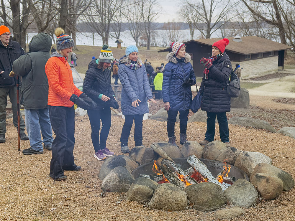 Warming by the bonfire after the hike.