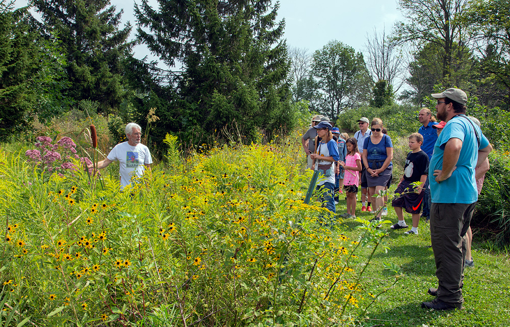 Western Great Lakes Bird & Bat Observatory director Mueller leading tour.