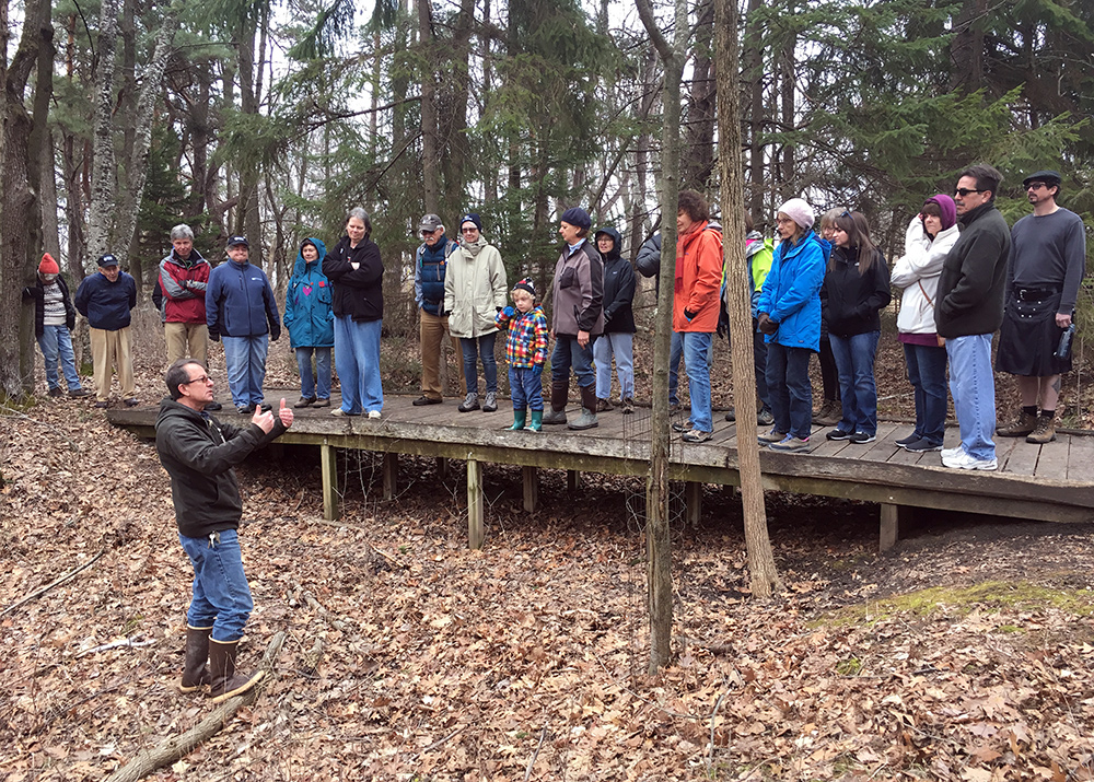 group standing on boarwalk/bridge