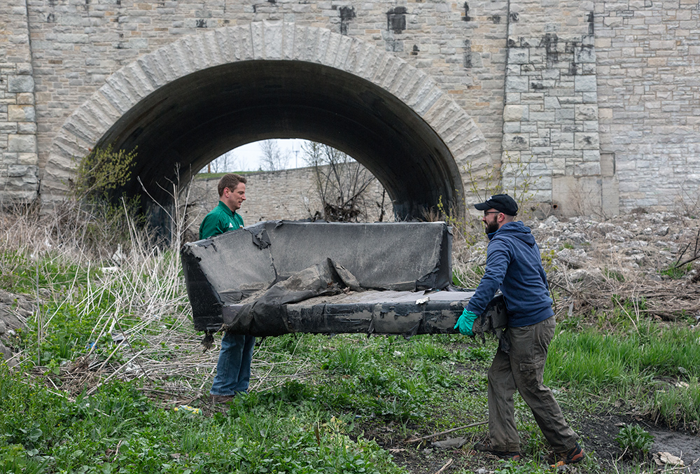 lifting a couch at Lincoln Creek