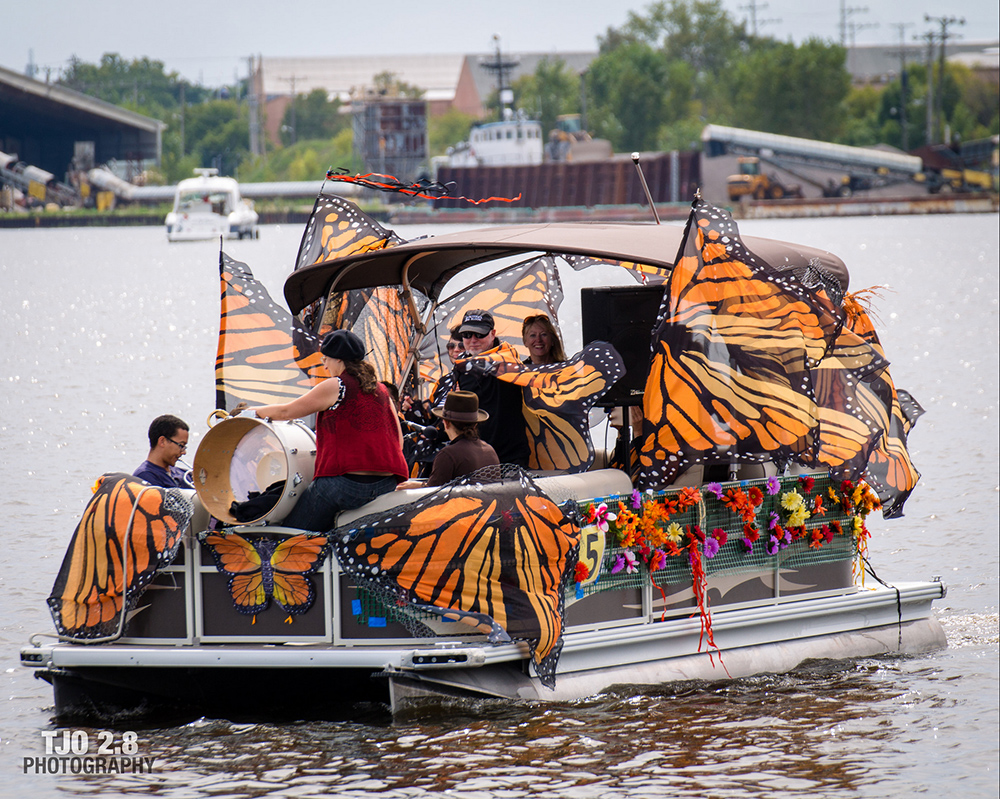 boat decorated with monarch butterflies