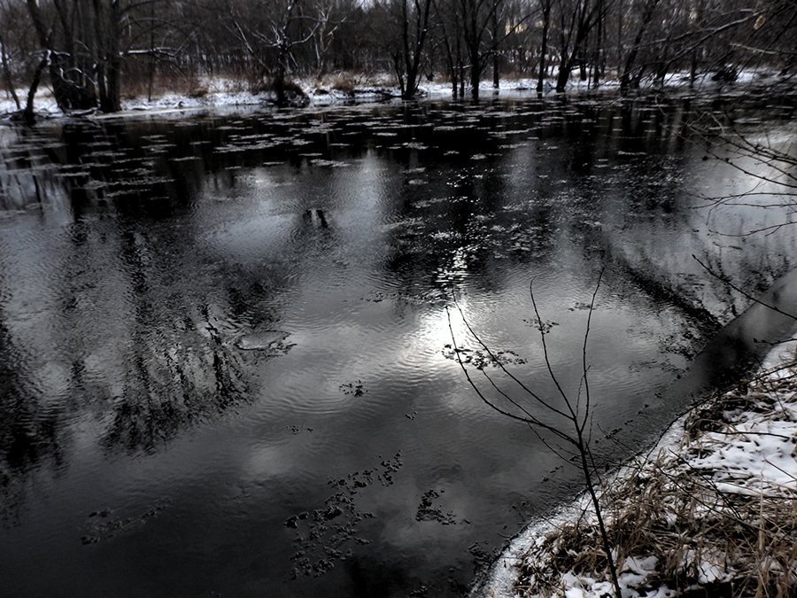 the sun and ice on the Milwaukee River