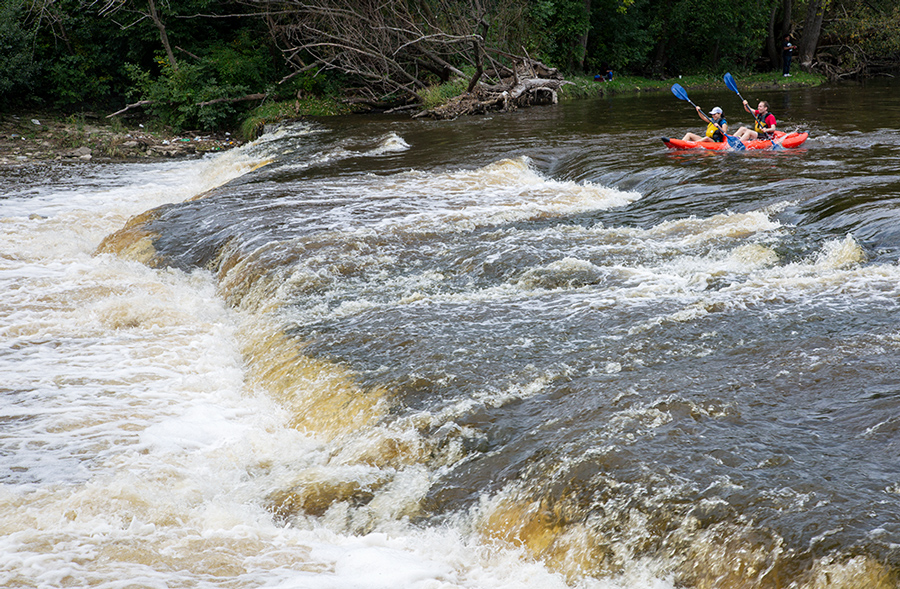 Red Raft approaching falls on the Milwaukee River at Estabrook Park