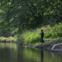 a boy fishing in the Fox RIver