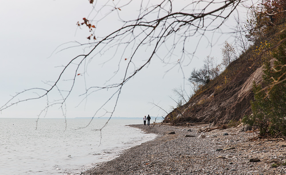 a couple on a beach at Lion's Den Gorge