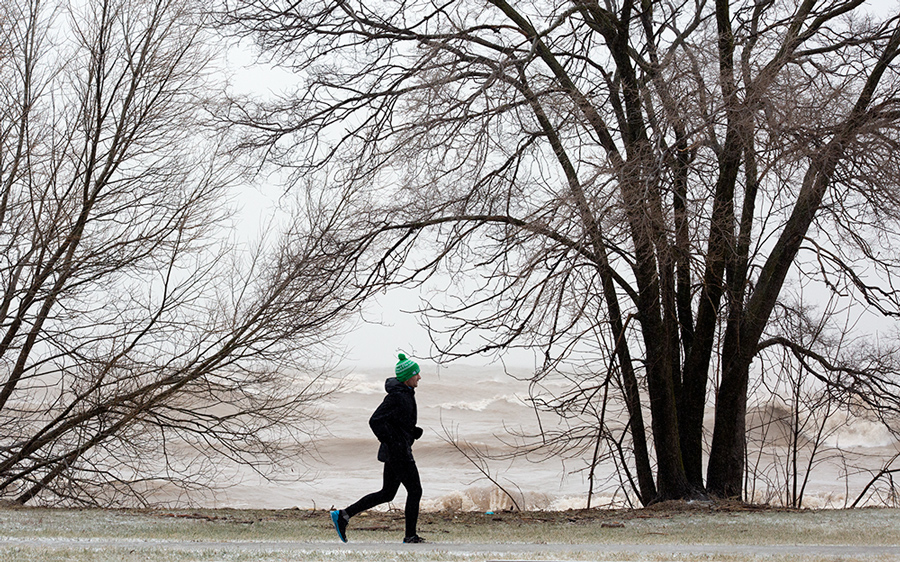 jogger and surf at Bradford Beach