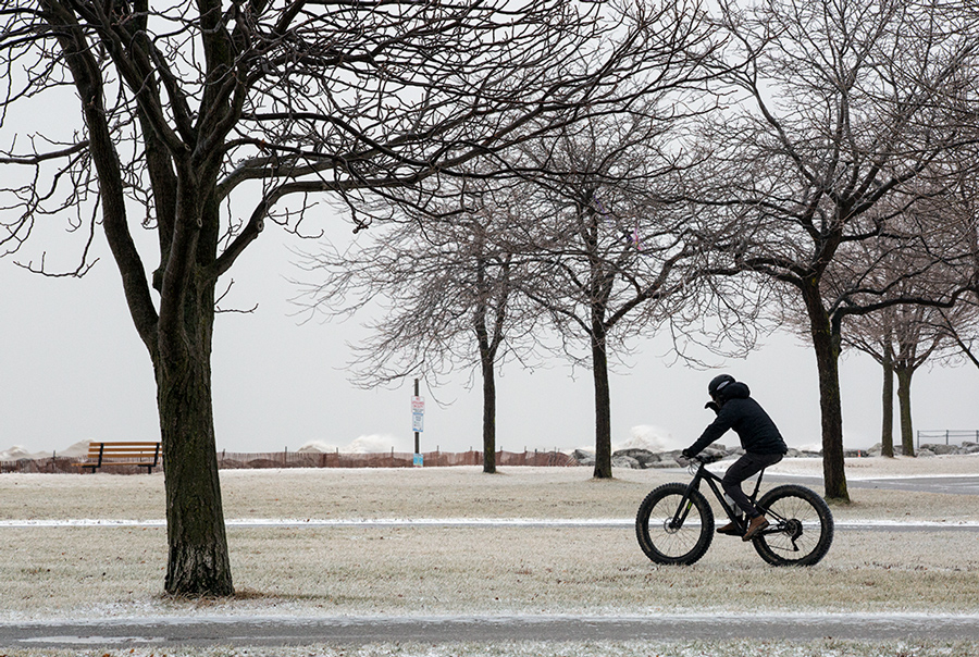 fat tire cyclist on Milwaukee lakefront in icy conditions