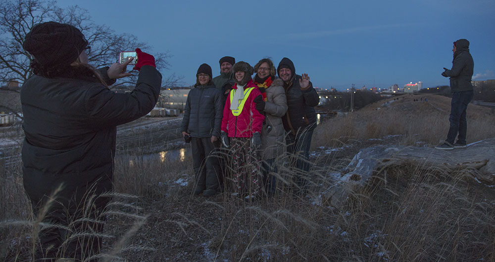 Family selfie at Urban Candlelight Hike in Three Bridges Park