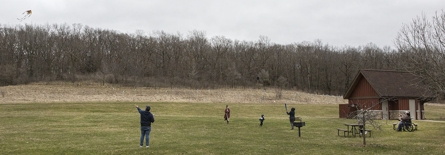 A family recreating in Fox River Park