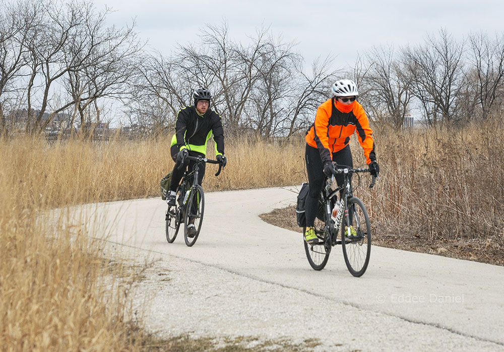 Two cyclists on Hank Aaron State Trail in Three Bridges Park