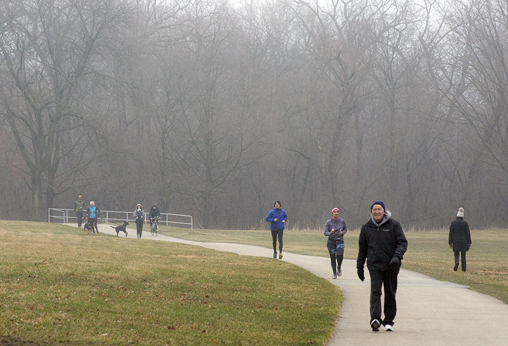 Social distancing is the rule on the Oak Leaf Trail in ever-popular Hoyt Park, Wauwatosa, even in foggy, drizzly conditions!