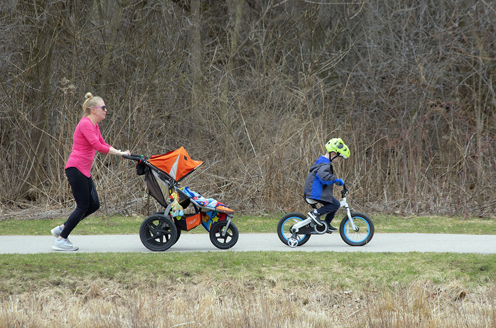 A family trio on the Menomonee River Parkway in Wauwatosa