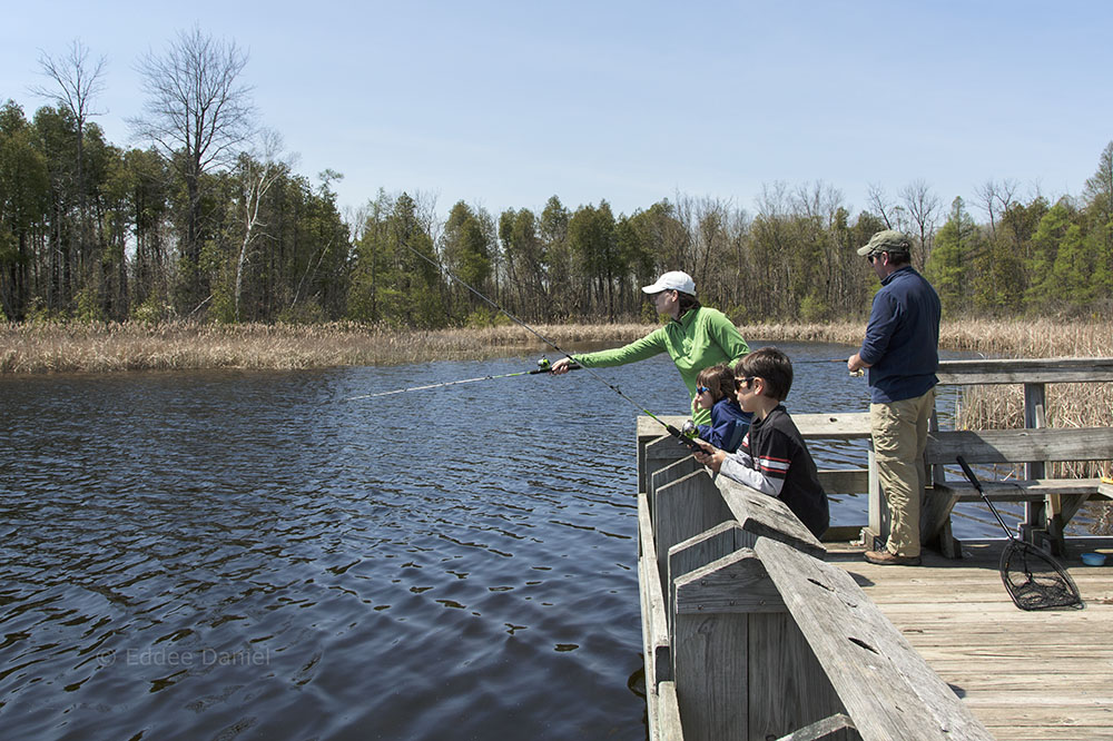 Family fishing at Watts Lake, Cedarburg Bog State Natural Area, Saukville