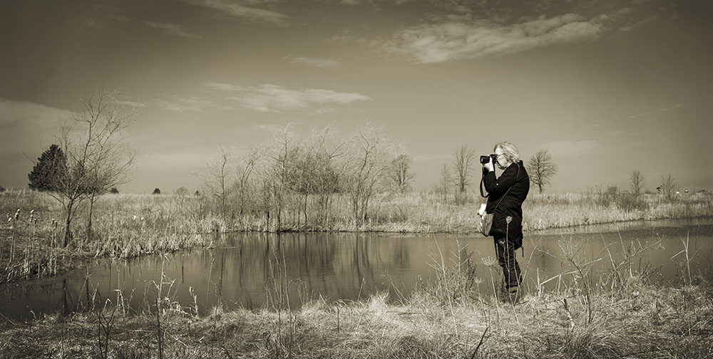 Artist in Residence Vicki Reed photographing at Forest Beach Migratory Preserve