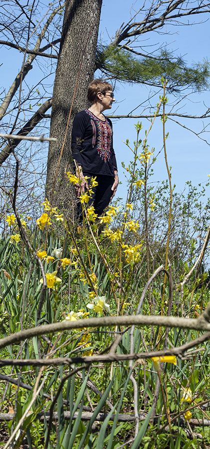 Barbara Manger standing at Lake Michigan bluff