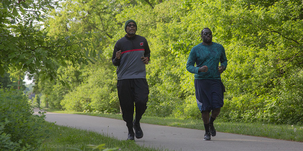 Two men running on Menomonee River Parkway