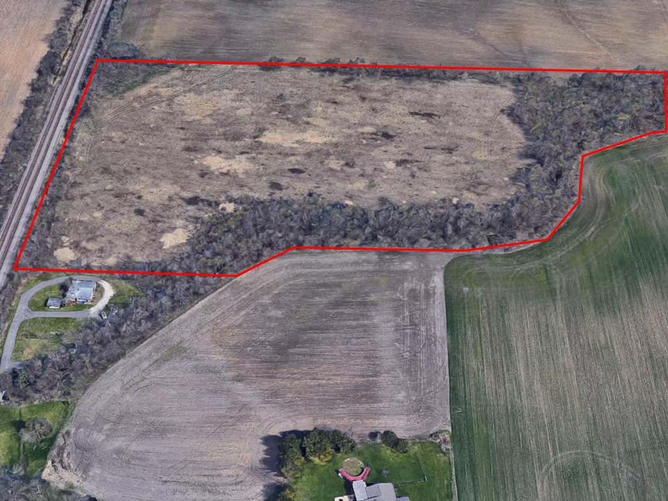 Aerial view showing project site on the north side of the Somers Branch.