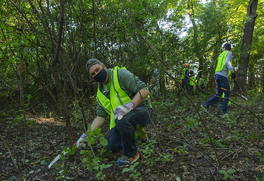 County Supervisor Shawn Rolland lends a hand.