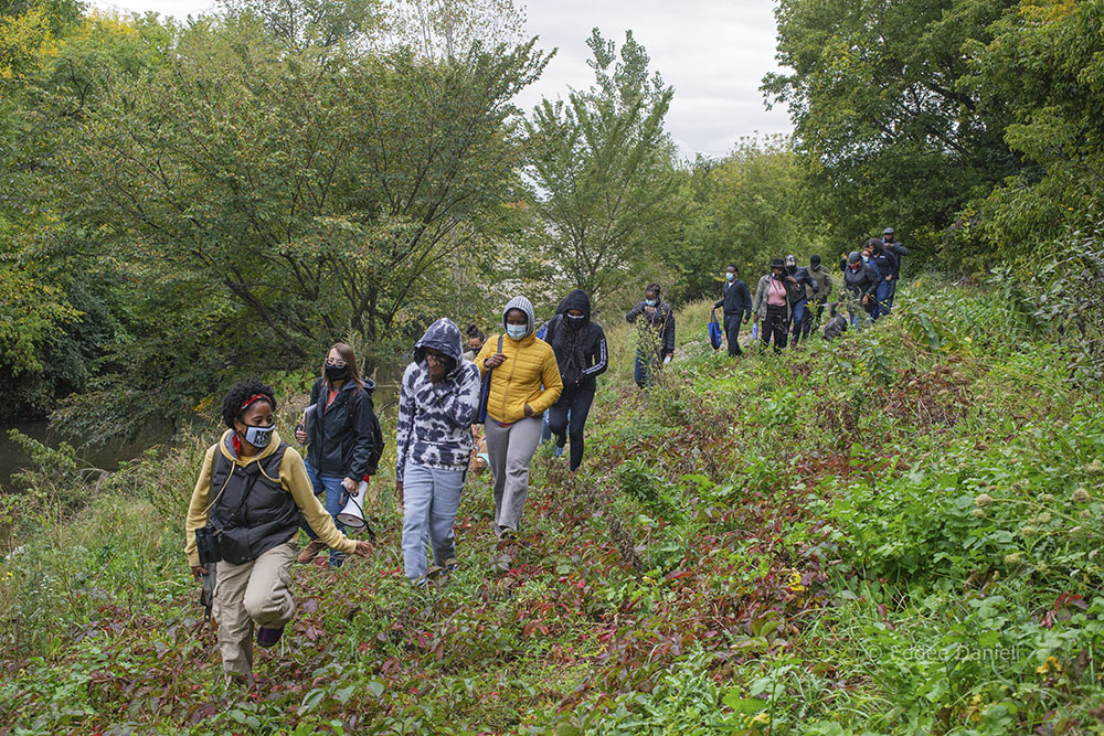 Sierra Taliaferro leading the hike into the Lincoln Creek greenway