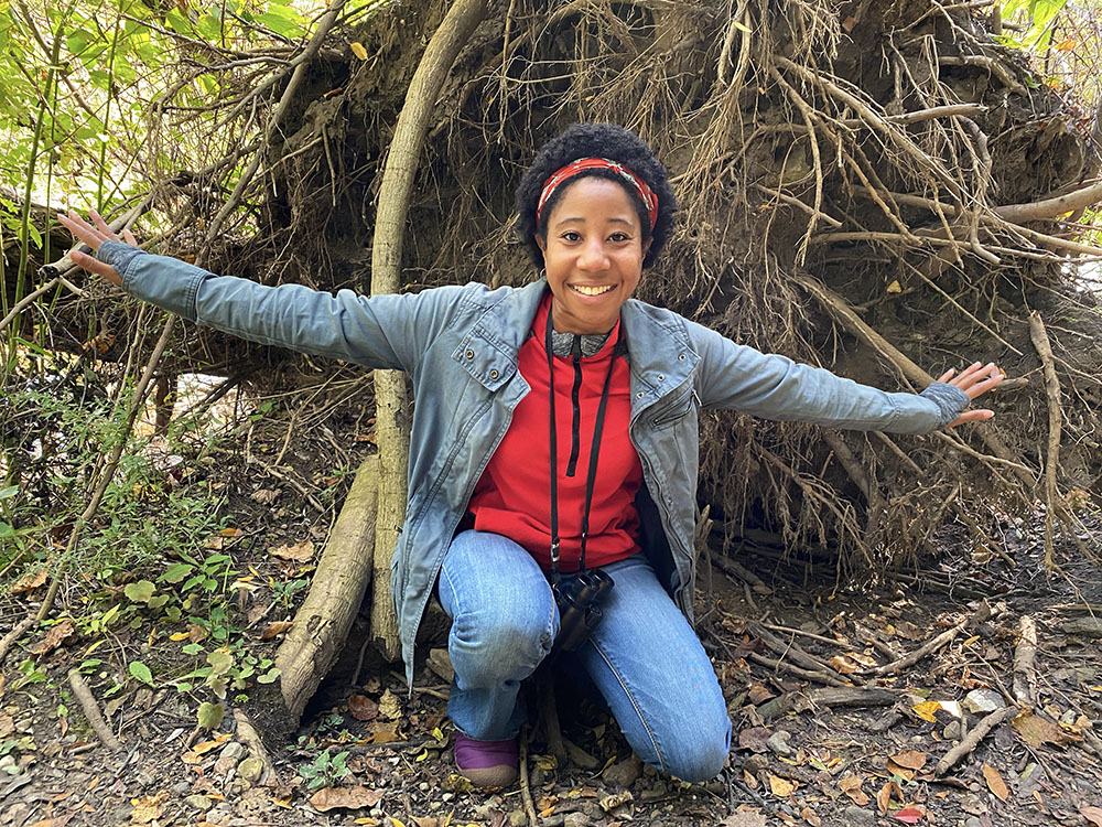 The author, grateful, in front of an upended root ball.