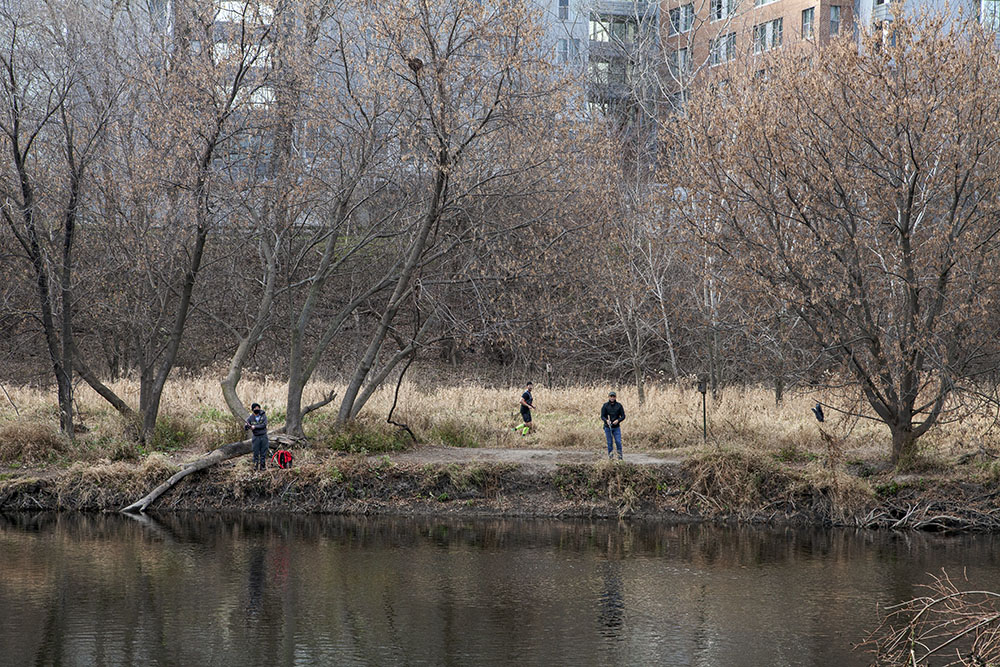 Fishing and jogging on the West Bank near North Avenue