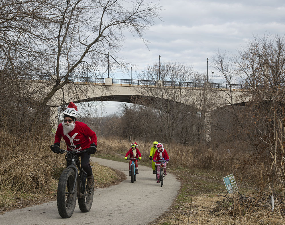 Cyclists on the Beerline Trail head for Santa Rampage 2019