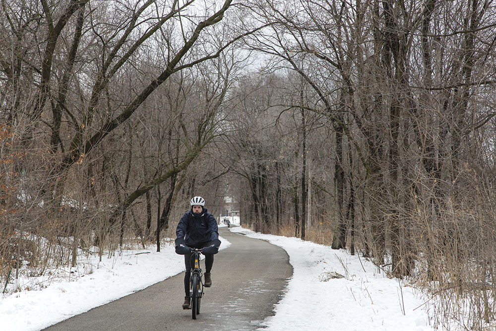 Cyclist on the Beerline Trail near Gordon Park