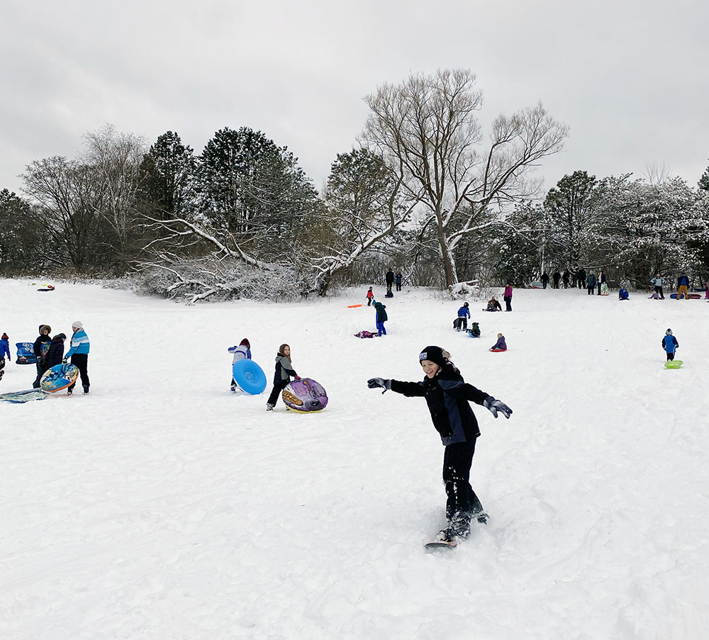 A young snow boarder at Curry Park.