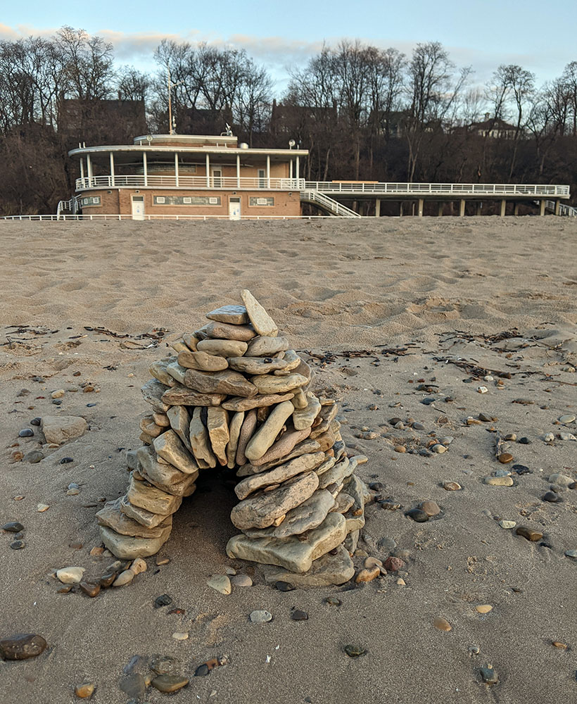 A rock cairn left on the beach.