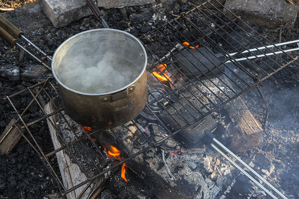 Sap boiling and pancakes frying on the campfire.