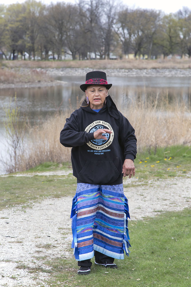 Oralann Caldwell, a Menominee Water Protector, introduces the group to the historical significance of the event.