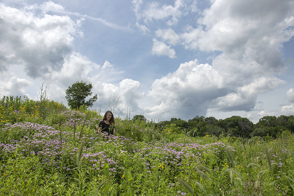 Urban Ecology Center Manager of Land Stewardship Kim Forbeck in the arboretum.