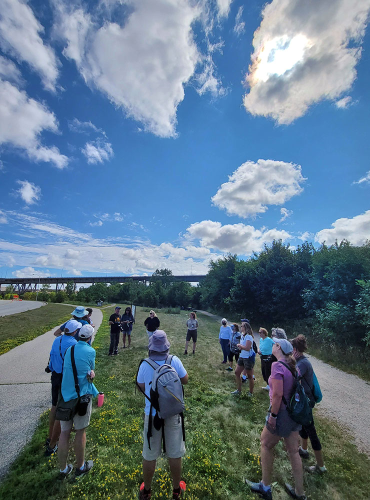 The group gathered on the Hank Aaron State Trail.