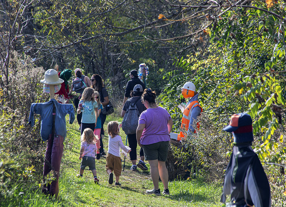 Families enjoying the Scarecrow Lane