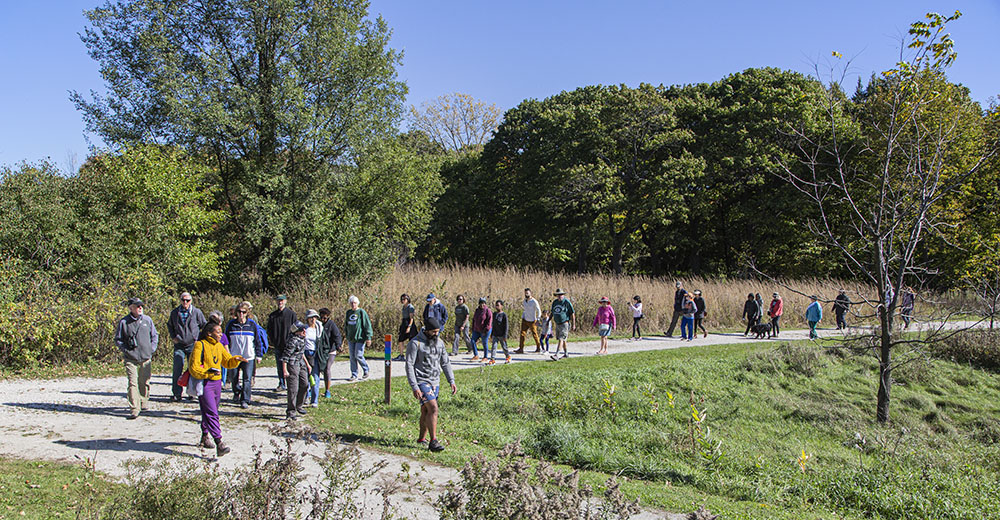 Nearby Nature MKE group hiking at Havenwoods