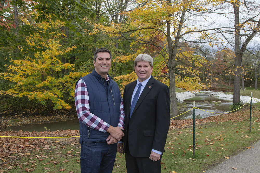 Kenosha County Parks Director Matt Collins and County Executive Jim Kreuser in front of the Pike River.