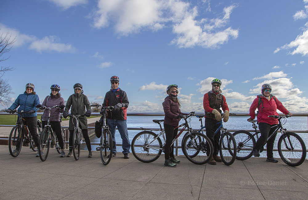 The riders take a brief break in Veteran's Park to pose for a group portrait.