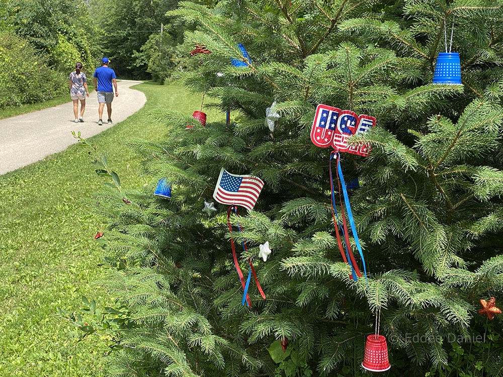 Patriotic decorations on a "Christmas tree" in July.