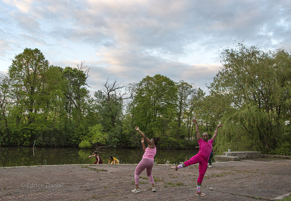 dancers on the steps of the lagoon