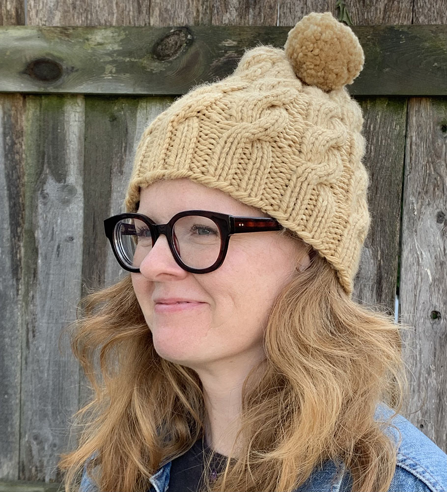 Sumac Cable Hat (worn by the artist)
Naturally dyed wool with sumac, hand knit. 2022