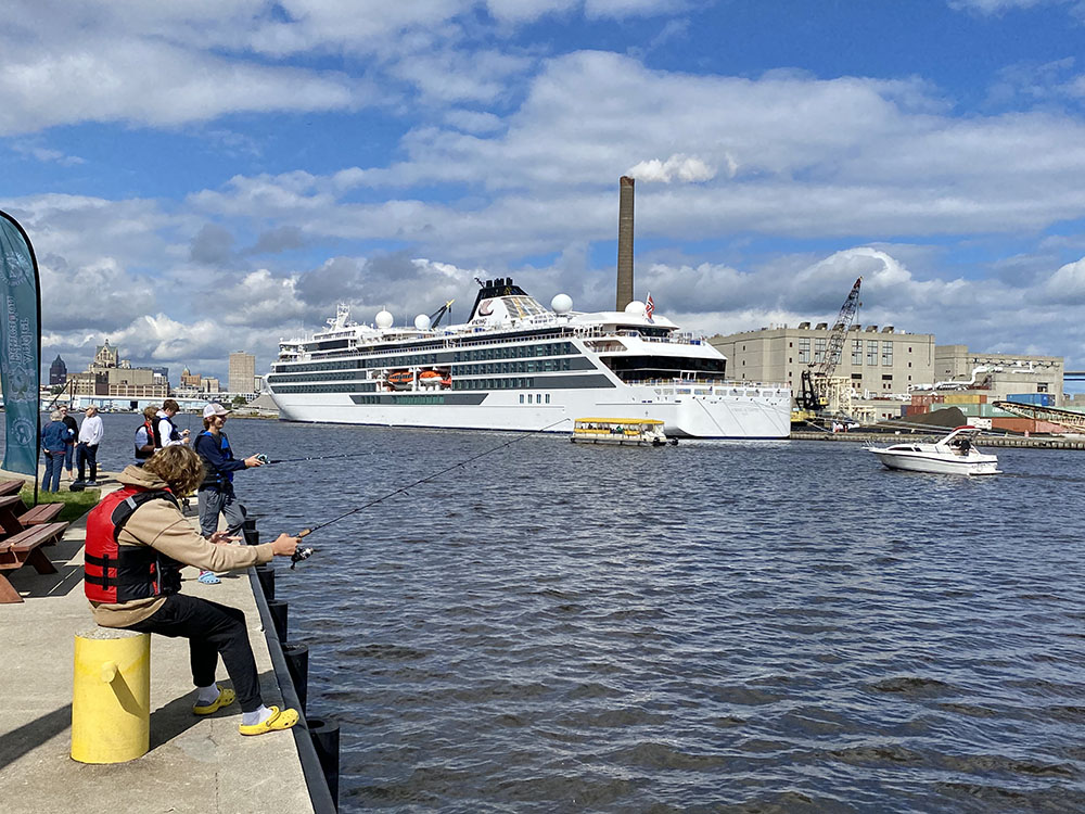 Fishing rods were available to Fest-goers courtesy the Fish and Wildlife Service, seen here in clear view of the Viking Cruise line ship getting ready to set out on the Great Lakes.