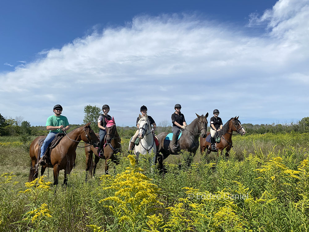 A family group stops to pose at King's Corner Preserve.