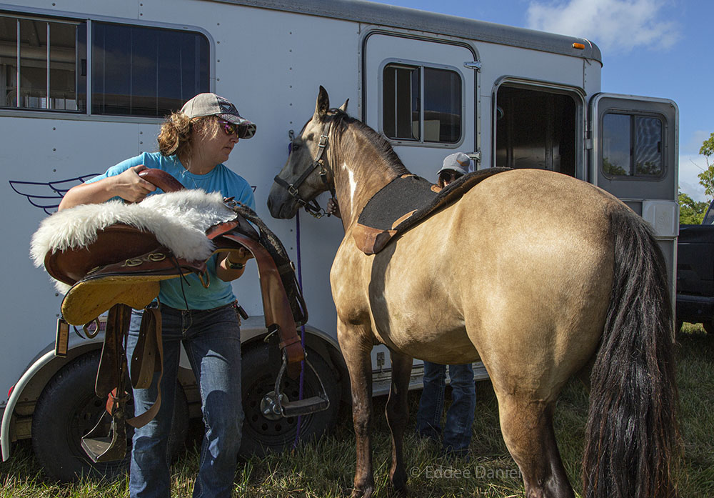 Jeralyn and Hayli Saddling Cowboy.