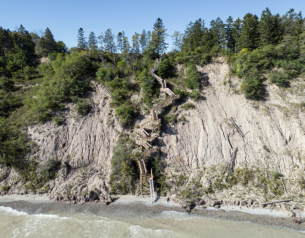 Aerial view of "floating" stairway facing the bluff.