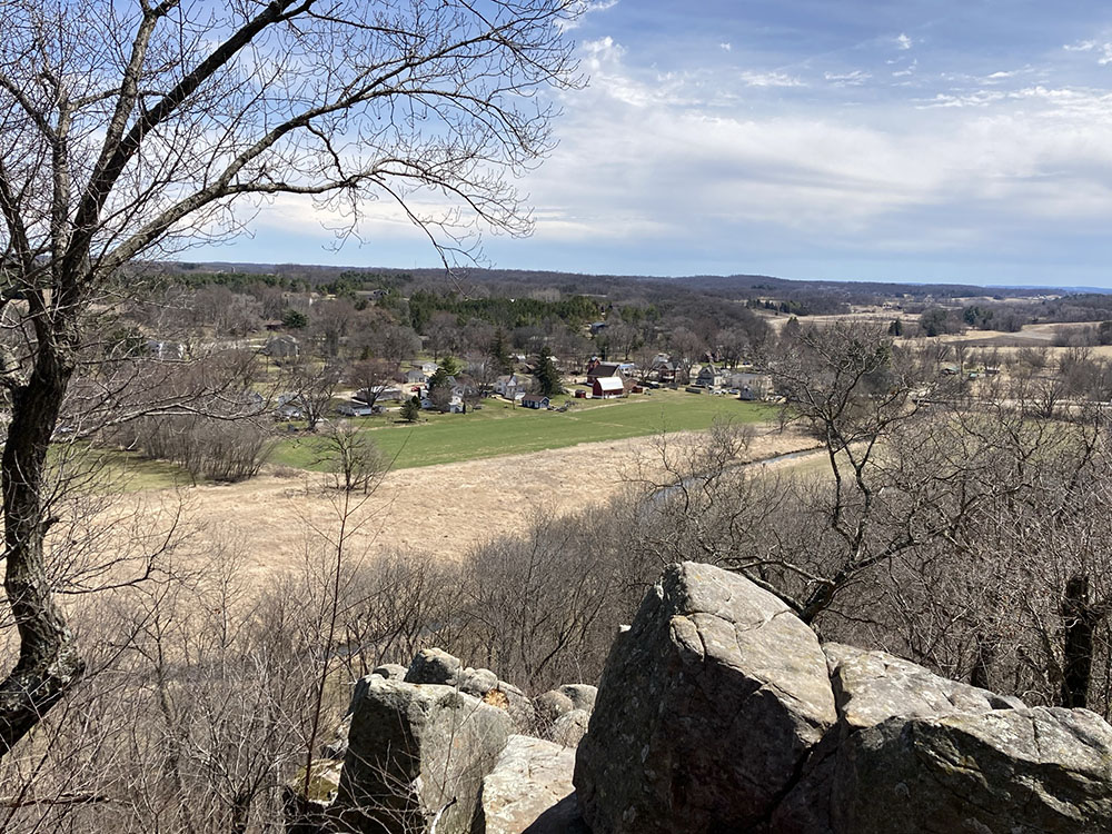 A trail up a rocky bluff leads to a lovely view of Mount Vernon.