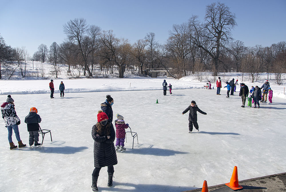 Ice skating lessons during the annual Winterfest organized by the Urban Ecology Center. 