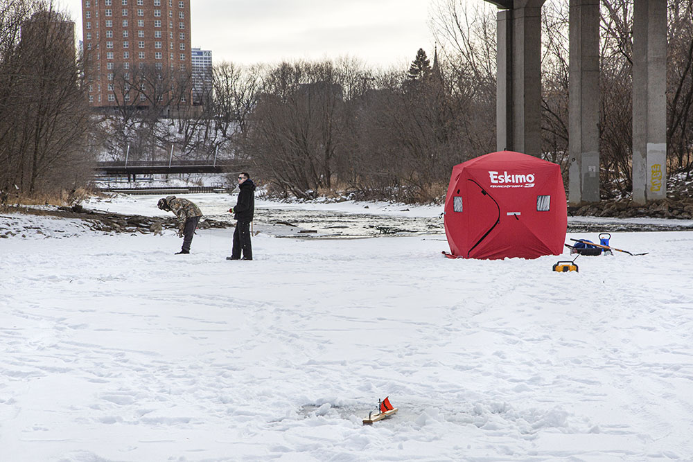 Ice fishing is very unusual on the Milwaukee River. Milwaukee River Greenway.