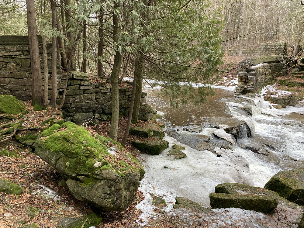 Riverside ruins where water was once harnessed.