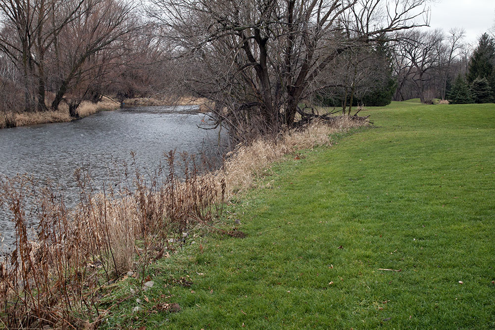 the green lawn of Hansen Golf Course next to the Menomonee River