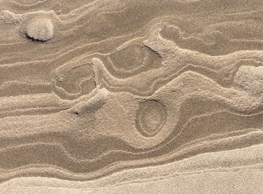 Wind-sculpted sand.